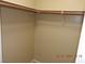 Walk-in closet featuring closet rod and shelving at 7840 Millhopper Ave, Las Vegas, NV 89128
