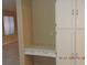 Dedicated desk area with drawers and cabinets providing ample storage solutions at 7840 Millhopper Ave, Las Vegas, NV 89128