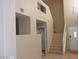 Welcoming entryway with staircase and high ceilings creates an open and airy ambiance at 7840 Millhopper Ave, Las Vegas, NV 89128