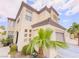 Low angle view of the exterior showcasing the building's facade and unique architectural details at 7840 Millhopper Ave, Las Vegas, NV 89128