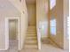 Foyer with staircase leading to the second floor at 7840 Millhopper Ave, Las Vegas, NV 89128