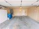 Spacious two car garage with ample storage and an additional entry door at 7840 Millhopper Ave, Las Vegas, NV 89128