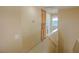 Upstairs hallway with wooden cabinets and view of rooms at 7840 Millhopper Ave, Las Vegas, NV 89128