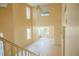 Spacious, light-filled living area with soaring ceilings and many windows at 7840 Millhopper Ave, Las Vegas, NV 89128