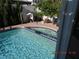 Refreshing swimming pool with clear water and colorful tile accents, perfect for relaxation at 7840 Millhopper Ave, Las Vegas, NV 89128
