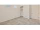 Bedroom with carpet, windows with blinds, and closet with double doors at 790 Sunny Sagebrush St, Henderson, NV 89011