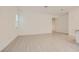 Bright and open living room featuring neutral tile flooring, and abundant natural light at 790 Sunny Sagebrush St, Henderson, NV 89011