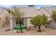 Aerial view of the home with desert landscaping and a private, enclosed back patio at 7934 Kiskadee St, North Las Vegas, NV 89084