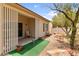 Low maintenance desert landscaping on view from the covered patio seating area at 7934 Kiskadee St, North Las Vegas, NV 89084