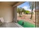 View from covered patio showcasing a low maintenance backyard with desert landscaping at 7934 Kiskadee St, North Las Vegas, NV 89084