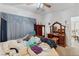 Bedroom featuring large window, bed, and dresser at 7934 Kiskadee St, North Las Vegas, NV 89084