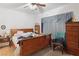 Bedroom featuring a ceiling fan, natural light and nice furnishings at 7934 Kiskadee St, North Las Vegas, NV 89084
