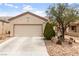 Well-maintained single-Gathering home featuring a two-car garage, desert landscaping, and a serene setting at 7934 Kiskadee St, North Las Vegas, NV 89084