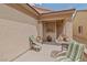 Inviting outdoor space with seating, ideal for enjoying fresh air and sunshine at 7934 Kiskadee St, North Las Vegas, NV 89084