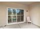 Comfortable covered patio featuring a sliding glass door and seating at 7934 Kiskadee St, North Las Vegas, NV 89084