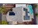 An aerial view of a home with solar panels, a pool, and privacy fencing at 8029 Chablis Bay St, Las Vegas, NV 89131