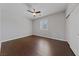 Charming bedroom features wood flooring, ceiling fan and a bright window at 8029 Chablis Bay St, Las Vegas, NV 89131