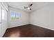 Cozy bedroom with closet, ceiling fan, and a bright window offering natural light at 8029 Chablis Bay St, Las Vegas, NV 89131
