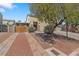 Charming stucco home with a three-car garage, stone accents, and professionally landscaped front yard at 8029 Chablis Bay St, Las Vegas, NV 89131