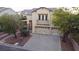 Charming home with a two-car garage and an inviting paved driveway at 8029 Chablis Bay St, Las Vegas, NV 89131