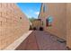 The side yard features desert landscaping and a stone pathway at 8029 Chablis Bay St, Las Vegas, NV 89131