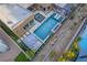Aerial view of a modern home featuring a swimming pool, spa, and outdoor living space, showcasing its luxurious backyard at 819 Bolide St, Las Vegas, NV 89138