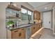 Stylish bar area with custom cabinetry, sleek countertops, and modern fixtures at 819 Bolide St, Las Vegas, NV 89138
