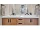 Bathroom with dual sinks, quartz countertop, and modern fixtures; perfect for a quick and easy morning routine at 819 Bolide St, Las Vegas, NV 89138