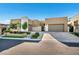 This modern home offers beautiful landscaping, stone accents, and a welcoming entrance for comfortable living at 819 Bolide St, Las Vegas, NV 89138
