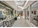 Bright and airy hallway featuring large windows and seamless flow to other living areas at 819 Bolide St, Las Vegas, NV 89138