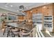 Modern kitchen with a large island, stainless steel appliances, and ample cabinet space at 819 Bolide St, Las Vegas, NV 89138