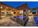 Stunning outdoor space with a pool, hot tub and outdoor dining area at 819 Bolide St, Las Vegas, NV 89138