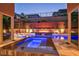 This inviting pool features a raised hot tub and fire feature at 819 Bolide St, Las Vegas, NV 89138