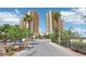 Beautiful view of the condominium towers, green landscaping and entry road at 8255 Las Vegas Blvd # 713, Las Vegas, NV 89123