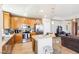 Modern kitchen featuring wood cabinetry, stainless steel appliances, tiled floors, and a kitchen island at 8255 Las Vegas Blvd # 713, Las Vegas, NV 89123