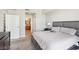 This main bedroom features cozy carpet, neutral walls, and an open entry into the main bathroom at 8255 Las Vegas Blvd # 713, Las Vegas, NV 89123