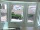 Bright dining area with multiple windows offering backyard views at 8901 Kingsmill Dr, Las Vegas, NV 89134