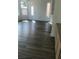 Open-concept living area boasting hardwood flooring and abundant natural light at 8901 Kingsmill Dr, Las Vegas, NV 89134