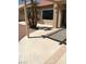 Outdoor patio area with a covered pergola and concrete flooring, ideal for relaxed outdoor living at 8901 Kingsmill Dr, Las Vegas, NV 89134