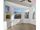 Bright sunroom with large windows offering a view of the home's exterior at 8901 Kingsmill Dr, Las Vegas, NV 89134