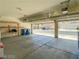 Attached two-car garage showcasing ample parking and storage space, with an open door at 8940 Emery Lake St, Las Vegas, NV 89123