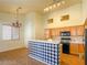 Bright kitchen featuring ample counter space, modern appliances, and stylish tile work at 8940 Emery Lake St, Las Vegas, NV 89123