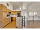 Well-lit kitchen featuring tile flooring, ample cabinet space, and modern appliances at 8940 Emery Lake St, Las Vegas, NV 89123