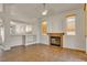 Cozy living room with a fireplace, tile flooring, and abundant natural light at 8940 Emery Lake St, Las Vegas, NV 89123