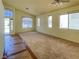 Spacious living room with large windows offering plenty of natural light at 8940 Emery Lake St, Las Vegas, NV 89123