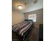 Bedroom with a bed, carpet, and a window at , Las Vegas, NV 89106