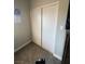 Bedroom closet with sliding white doors and neutral carpet at , Las Vegas, NV 89106