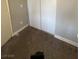 Bedroom closet with sliding white doors and neutral carpet at , Las Vegas, NV 89106