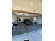 Garage featuring a black car, with a washing machine and other supplies on the sides at , Las Vegas, NV 89106