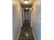 View of the hallway with wood flooring, light gray walls, and white trim at , Las Vegas, NV 89106